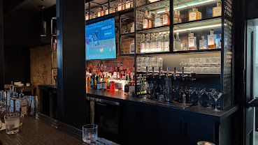 Monk's Road Boiler House bar with TV